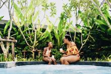 Tash traveling with her daughter