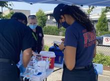 Port of Seattle Firefighters administer shots