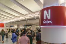 Crowds at the airport wait for the train