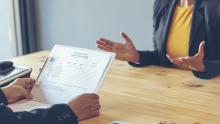 Two people conducting a job interview