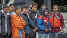 Mixed group of students learn the ropes at Fishermens Terminal from a Port employee 2019