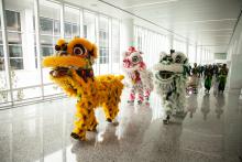 Mak Fai Dragon & Lion Dancers leading guests into the IAF