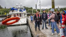 Youth learn about safe boating protocols at Shilshole Bay Marina in Seattle