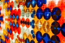 Close up of Eyes on the World. Colors of blue, yellow, and red.