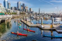 People kayaking in Bell Harbor Marina 