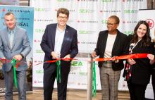 SEA and Air Canada officials at the ribbon cutting