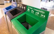 Photo of bins for compost, recycling, and garbage waste.