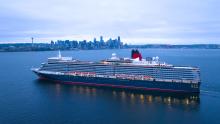 Cruise ship Queen Elizabeth, operated by the Cunard Line, in front of the Seattle waterfront
