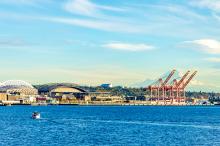 Elliott Bay and the southern Seattle waterfront with Mount Rainier in the background
