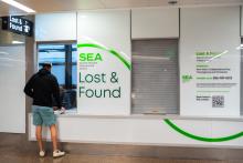 Customer getting help at Lost and Found