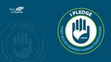  Image of a blue hand that says "I Pledge" and "Port Allies Against Human Trafficking"