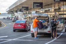 Passengers being dropped off at the terminal.