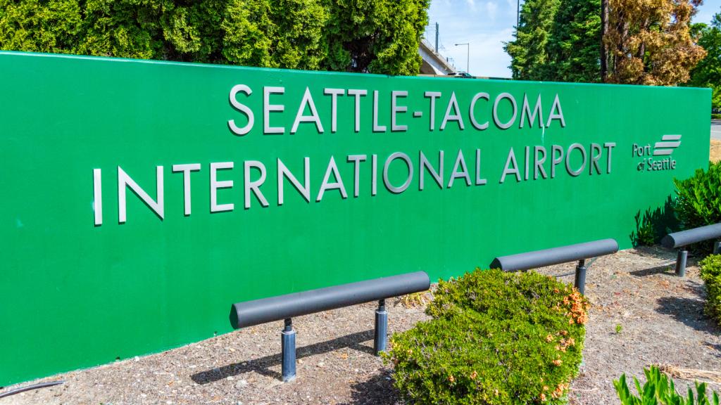 Airport sign reading "Seattle-Tacoma International Airport"