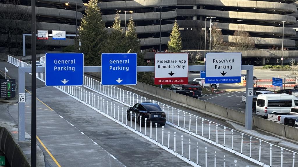 A car driving up to the SEA Airport Parking Garage.